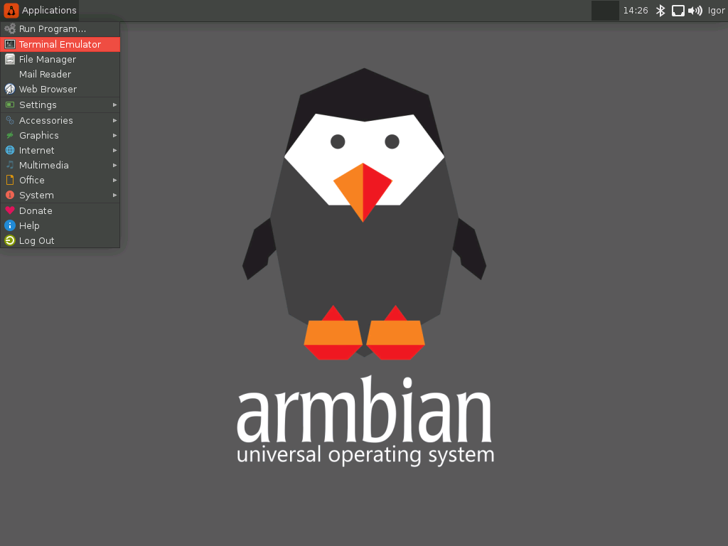 Zaslonska slika armbian sistema (stiliziran pingvin v ozadju)